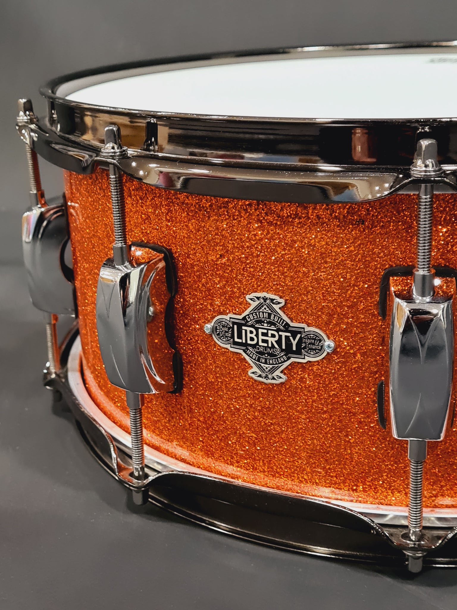 14x5.5" Liberty Drums Snare drum in a stunning orange sparkle lacquer (made to order)