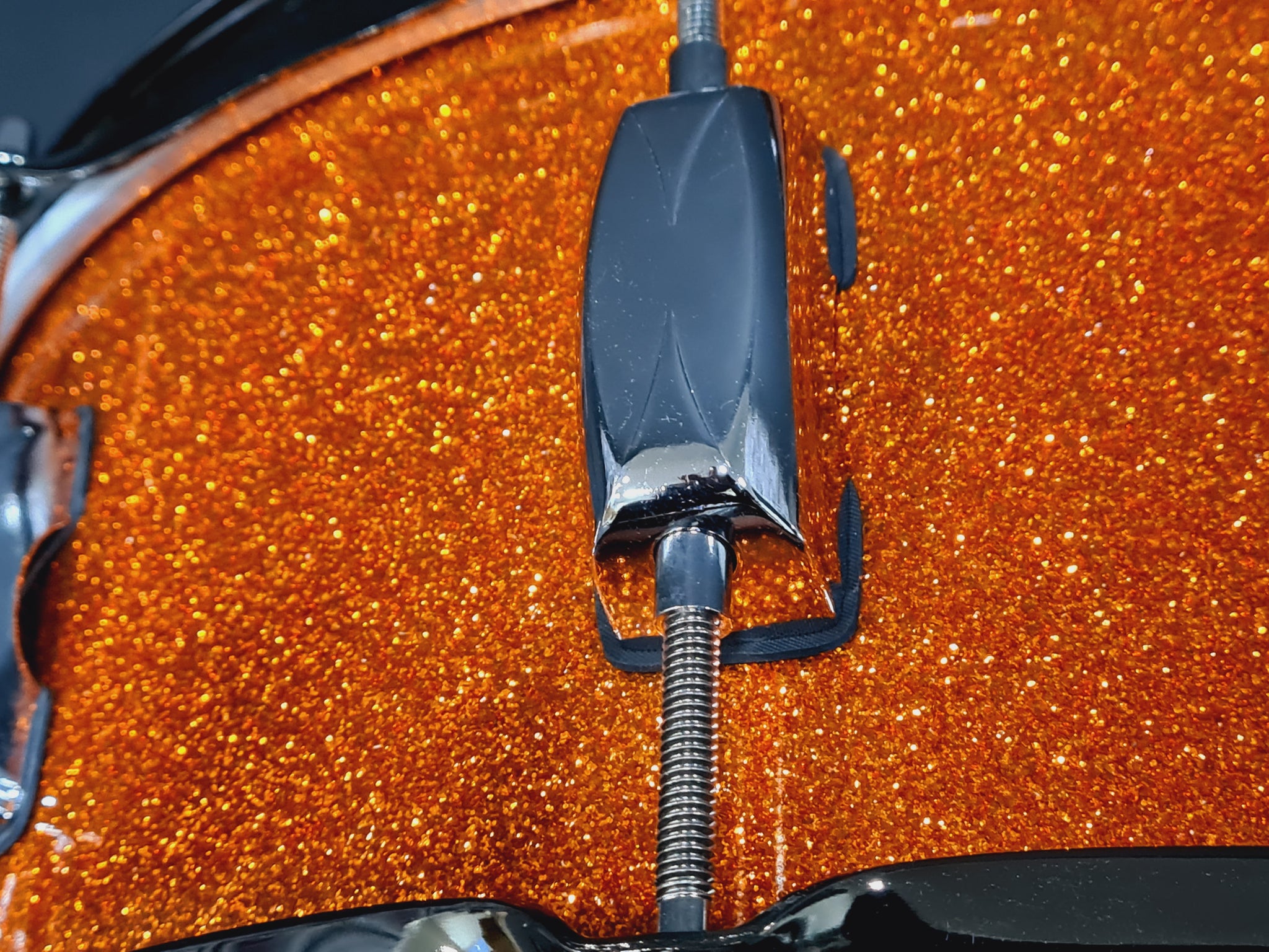 14x5.5" Liberty Drums Snare drum in a stunning orange sparkle lacquer